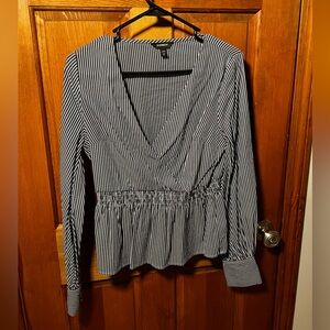 Express Top. Navy and white stripes. Buttons on cuff. V neckline. Size M.